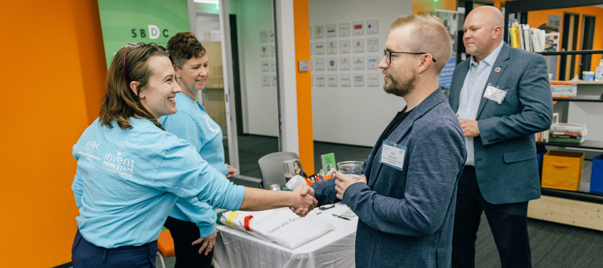 Two people shaking hands at Global Entrepreneurship Week Penn State, which provides entrepreneurship and small business resources